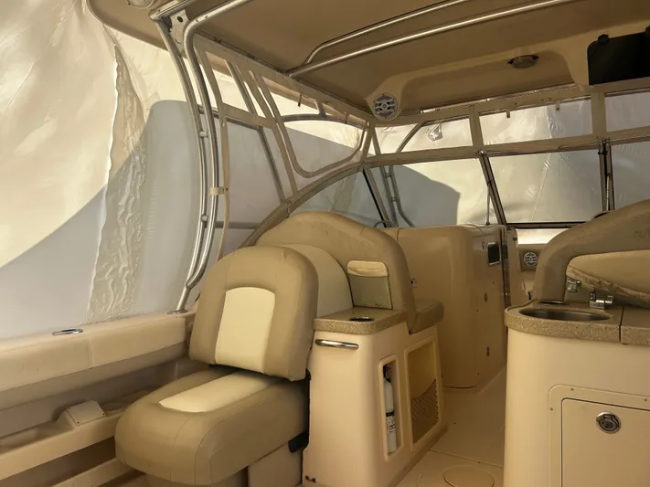  Yacht Photos Pics Interior of a 2011 Grady-White 307 boat with beige seating.