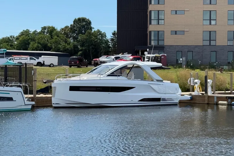  Yacht Photos Pics 2026 Jeanneau DB/37 OB yacht docked at marina, modern design, sunny day.