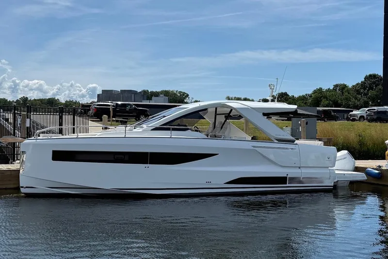  Yacht Photos Pics 2026 Jeanneau DB/37 OB luxury yacht docked on a sunny day.