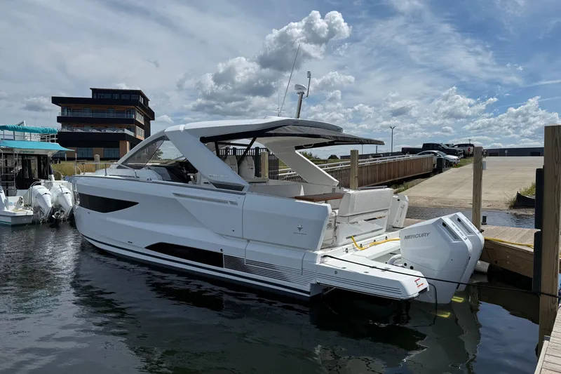  Yacht Photos Pics 2026 Jeanneau DB/37 OB boat docked, featuring sleek design and Mercury outboard engines.