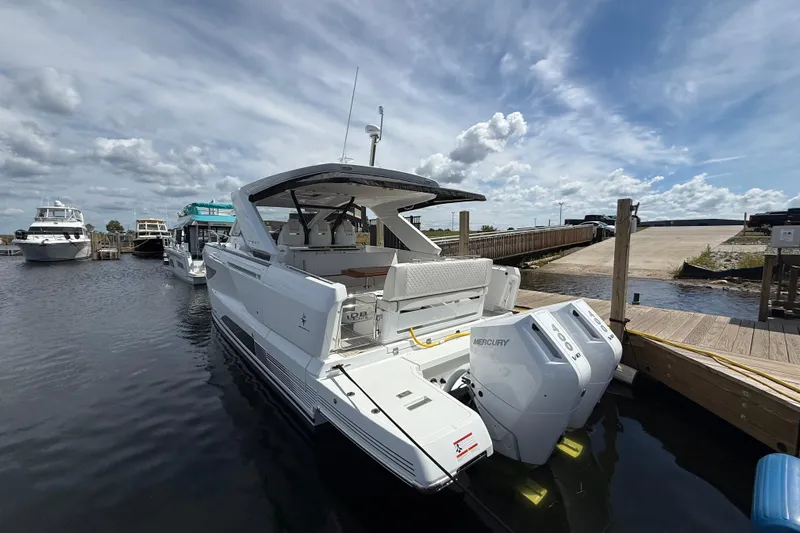  Yacht Photos Pics 2026 Jeanneau DB/37 OB boat docked with twin Mercury outboard engines.
