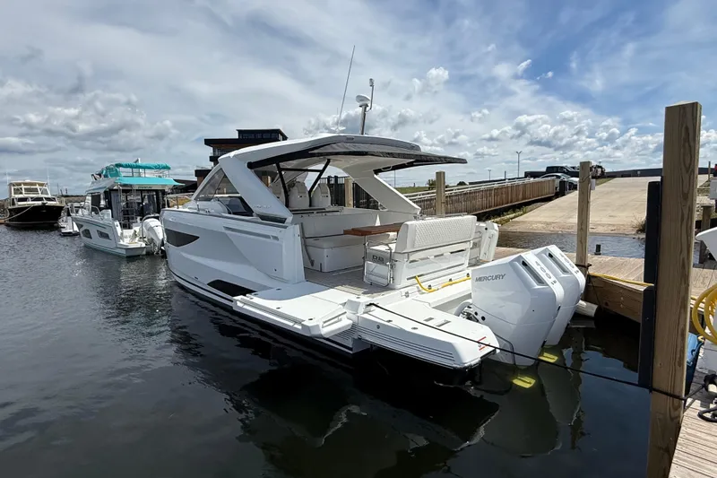  Yacht Photos Pics 2026 Jeanneau DB/37 OB boat docked with twin Mercury outboard engines.