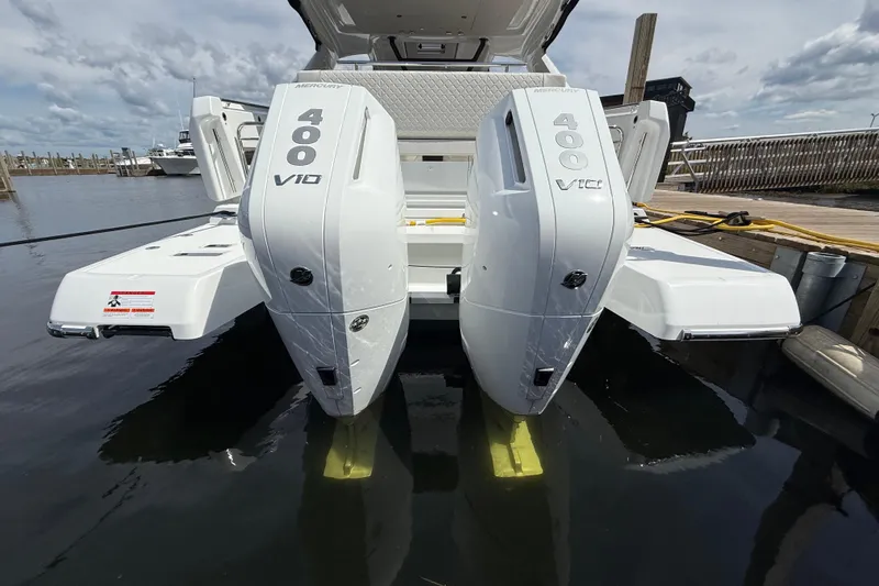  Yacht Photos Pics 2026 Jeanneau DB/37 OB with dual Mercury 400 V10 engines docked at marina.