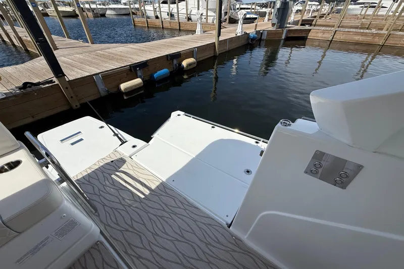  Yacht Photos Pics 2026 Jeanneau DB/37 OB boat docked at marina, featuring spacious deck area.