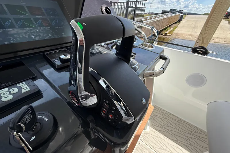  Yacht Photos Pics 2026 Jeanneau DB/37 OB boat helm with advanced controls and navigation system.