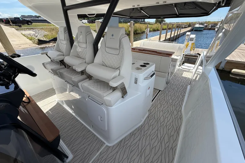  Yacht Photos Pics 2026 Jeanneau DB/37 OB boat interior with luxurious seating and modern design.