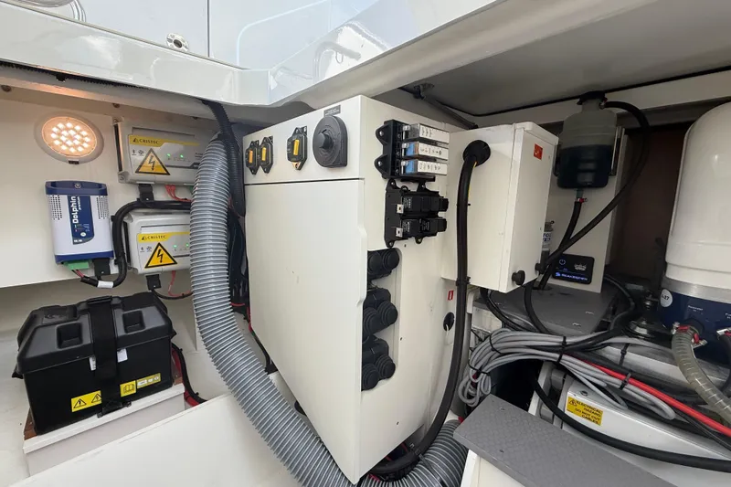  Yacht Photos Pics Electrical system of 2026 Jeanneau DB/37 OB boat, featuring wiring and control panels.