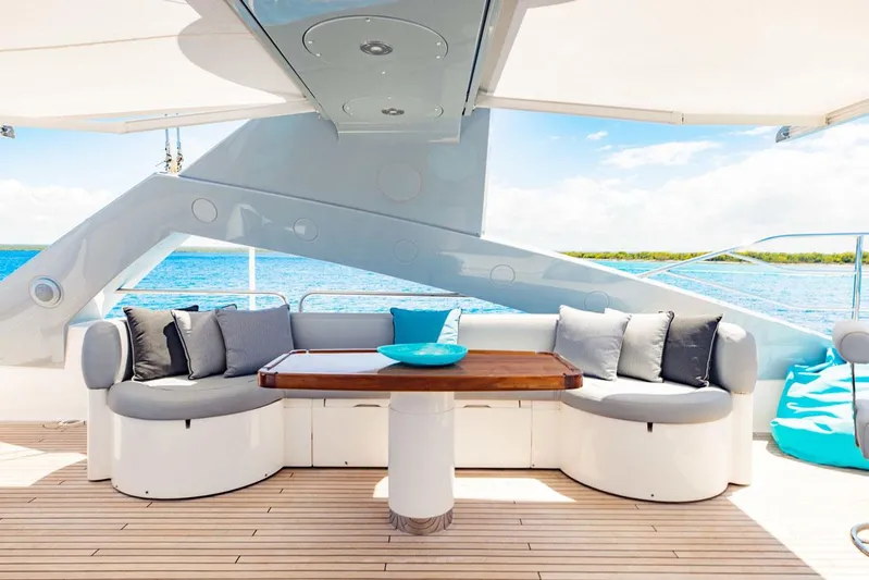 Tayrona Yacht Photos Pics Luxurious Sunseeker 131 Yacht 2012 deck with elegant seating and ocean view.