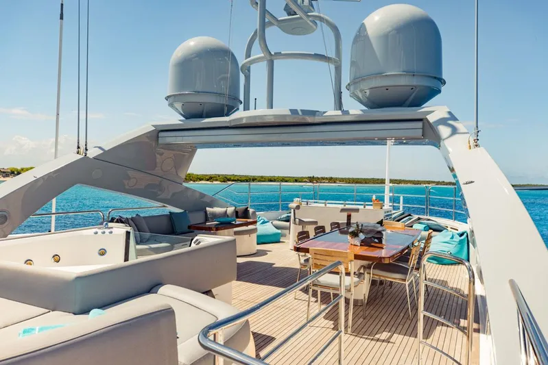 Tayrona Yacht Photos Pics Luxurious Sunseeker 131 Yacht deck with seating and dining area, 2012 model.