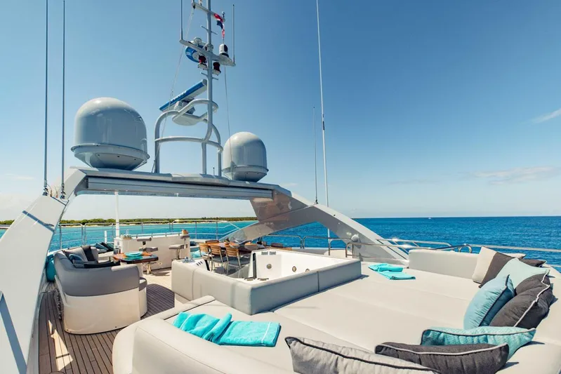 Tayrona Yacht Photos Pics Luxurious Sunseeker 131 Yacht deck with seating, jacuzzi, and ocean view, 2012 model.