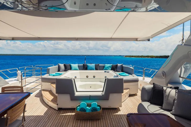 Tayrona Yacht Photos Pics Luxurious Sunseeker 131 Yacht deck with jacuzzi, ocean view, and elegant seating, 2012 model.