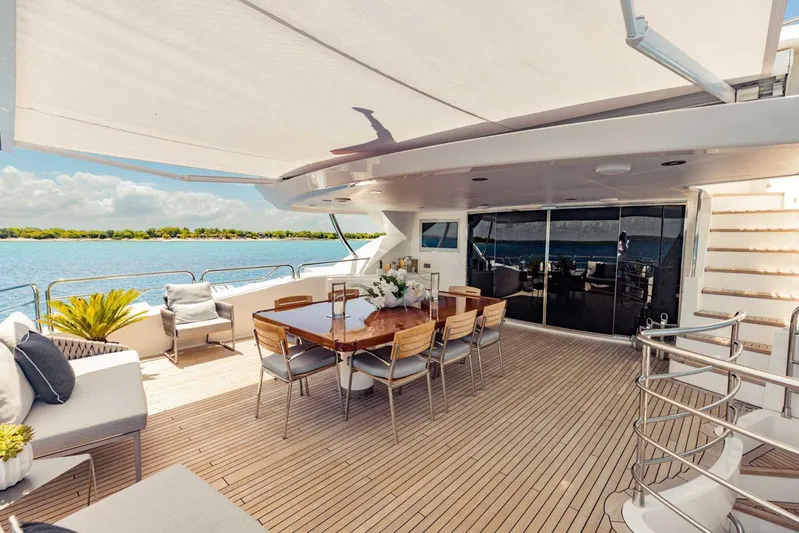 Tayrona Yacht Photos Pics Luxurious Sunseeker 131 Yacht 2012 with elegant outdoor dining area and ocean view.