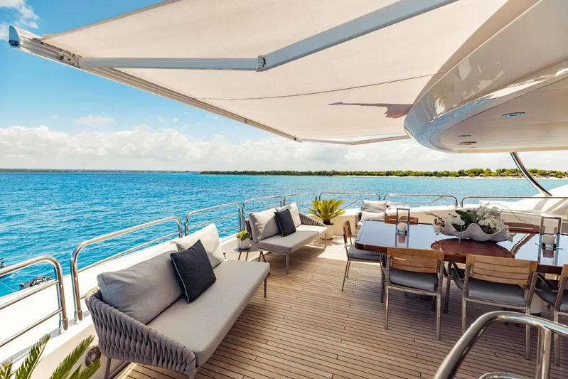 Tayrona Yacht Photos Pics Luxurious Sunseeker 131 Yacht deck with elegant seating and ocean view, 2012 model.