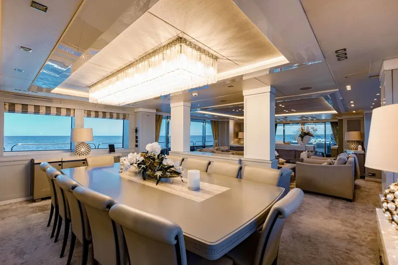 Tayrona Yacht Photos Pics Luxurious interior of 2012 Sunseeker 131 Yacht with elegant dining area and ocean views.