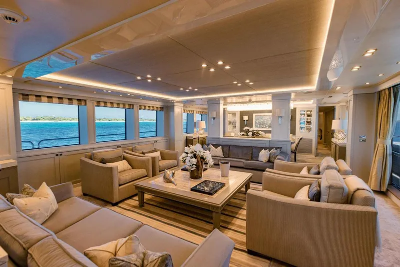 Tayrona Yacht Photos Pics Luxurious interior of 2012 Sunseeker 131 Yacht with elegant seating and ocean view.