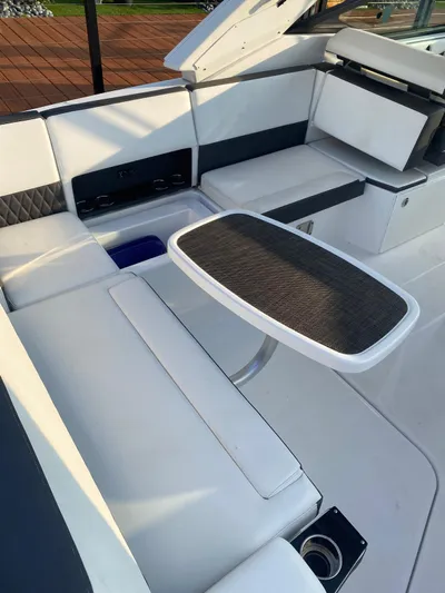  Yacht Photos Pics Luxury seating area on a 2019 Monterey 378 boat with sleek design.