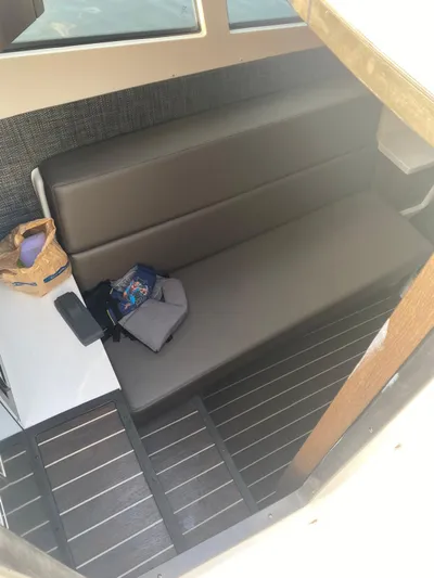  Yacht Photos Pics Interior of 2019 Monterey 378 boat with cushioned seating and accessories.