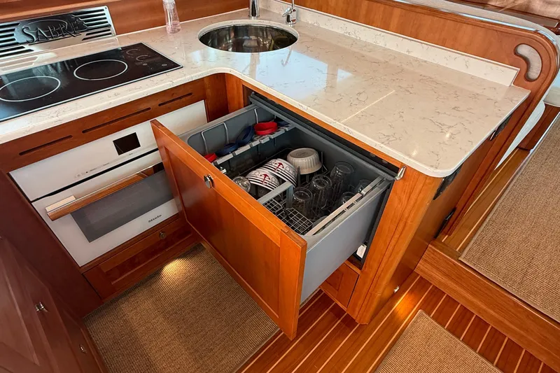  Yacht Photos Pics Fisher and Paykel Dishwasher, Mielle Speed Oven, and Two Burner Stove Top