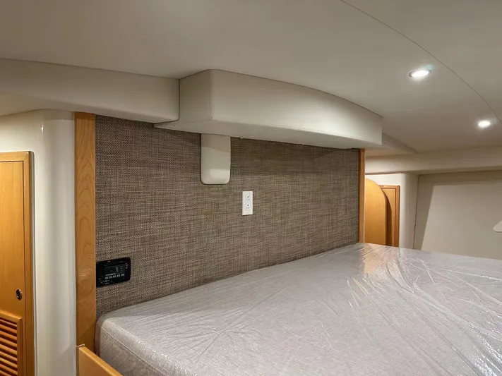  Yacht Photos Pics 2025 ArrowCat 420 Flybridge interior cabin with modern design and comfortable bedding.