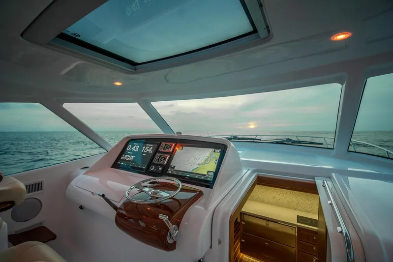  Yacht Photos Pics Interior helm of 2025 Mag Bay 42 yacht with advanced navigation system.