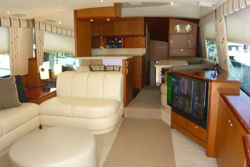 Bella Donna Yacht Photos Pics Luxurious interior of a 1999 Ocean Yachts 56, featuring elegant seating and modern amenities.