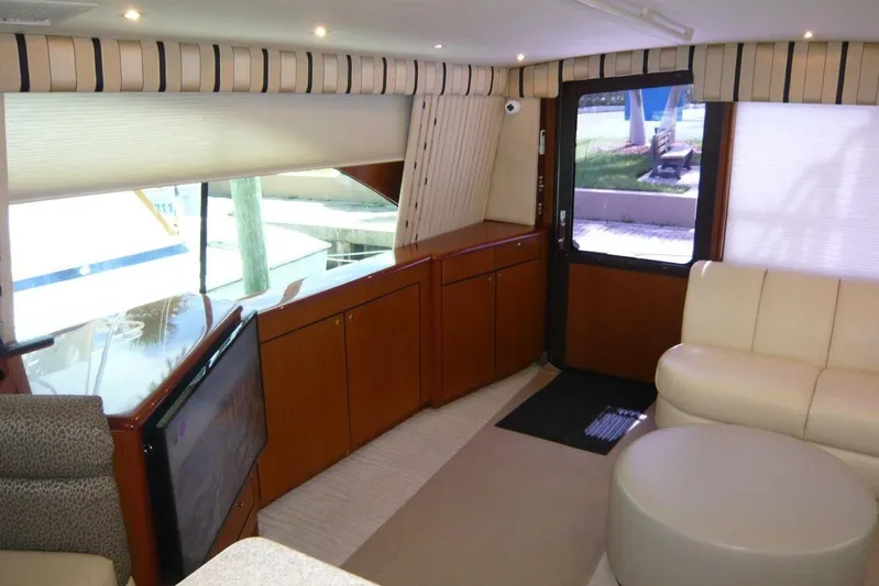 Bella Donna Yacht Photos Pics Luxurious interior of a 1999 Ocean Yachts 56, featuring elegant seating and modern design.