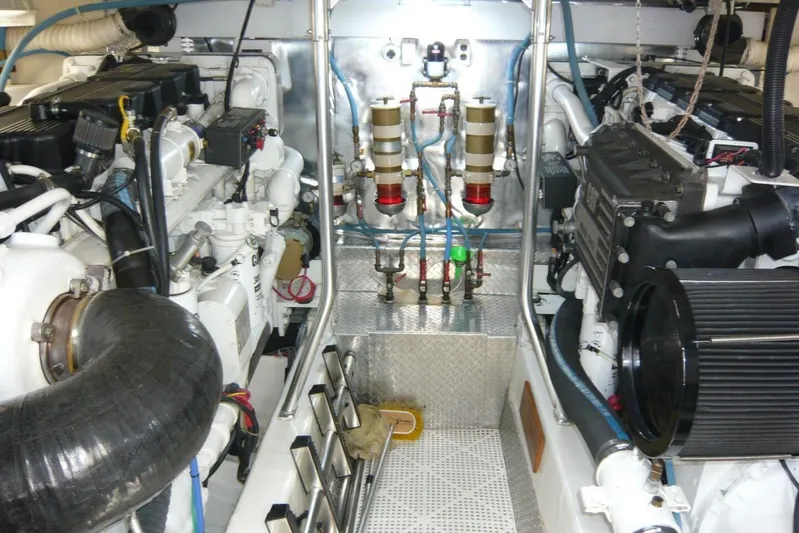 Bella Donna Yacht Photos Pics Engine room of 1999 Ocean Yachts 56, showcasing mechanical components and systems.