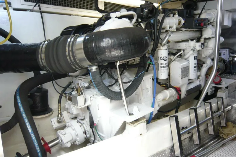 Bella Donna Yacht Photos Pics Engine room of a 1999 Ocean Yachts 56, featuring CAT machinery and components.