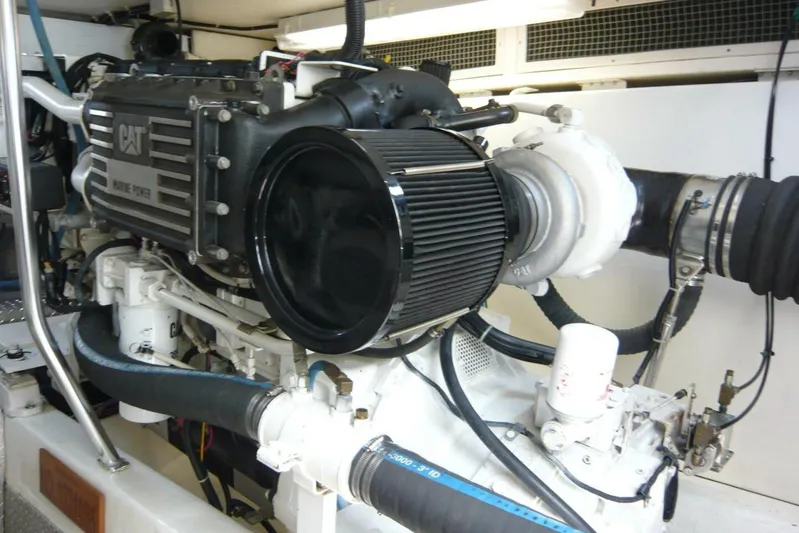 Bella Donna Yacht Photos Pics Engine room of 1999 Ocean Yachts 56, featuring a CAT marine power engine.