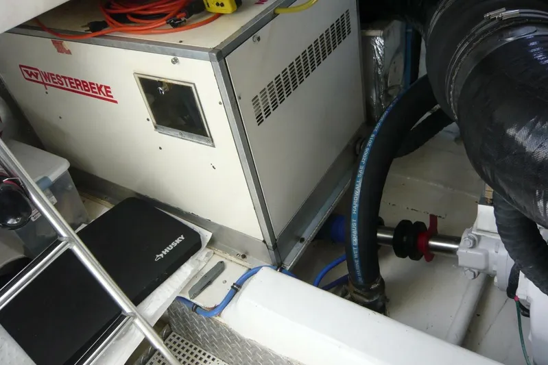 Bella Donna Yacht Photos Pics Engine room of a 1999 Ocean Yachts 56 with Westerbeke generator and equipment.
