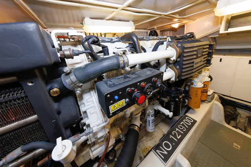 Independence Yacht Photos Pics Engine room of 2009 Hunt Yachts 52 Express, featuring CAT marine power system.