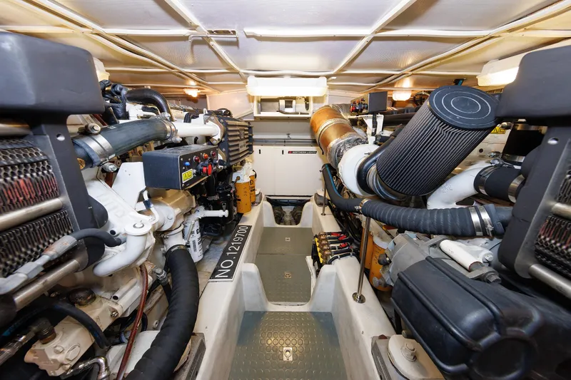 Independence Yacht Photos Pics Engine room of 2009 Hunt Yachts 52 Express, showcasing mechanical components and systems.