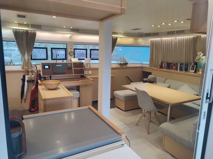 Bada Bing Yacht Photos Pics Interior of 2014 Lagoon 52 yacht, featuring modern kitchen and cozy seating area.