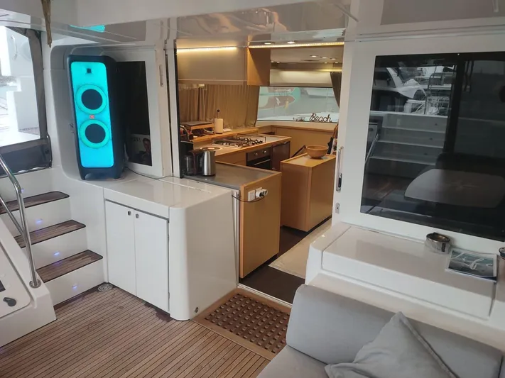 Bada Bing Yacht Photos Pics Interior of 2014 Lagoon 52 yacht featuring modern kitchen and stylish seating area.