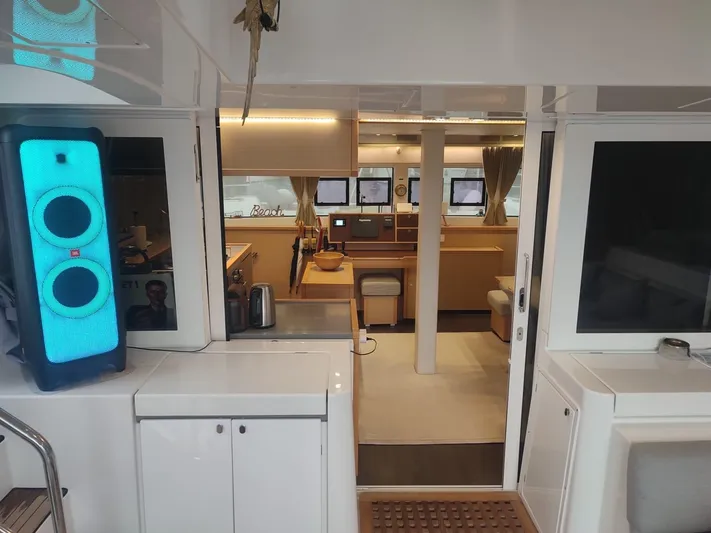 Bada Bing Yacht Photos Pics Interior view of 2014 Lagoon 52 yacht, featuring modern navigation equipment and stylish design.