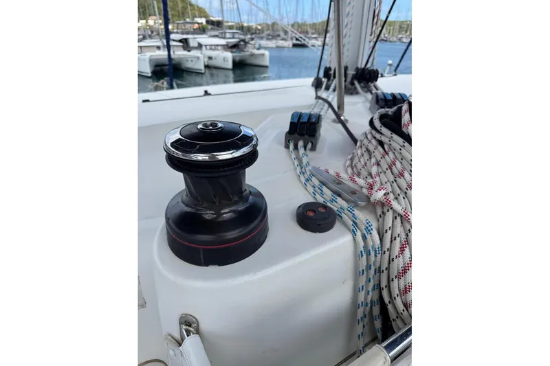  Yacht Photos Pics Winch and ropes on 2018 Lagoon 42 catamaran deck, marina background.