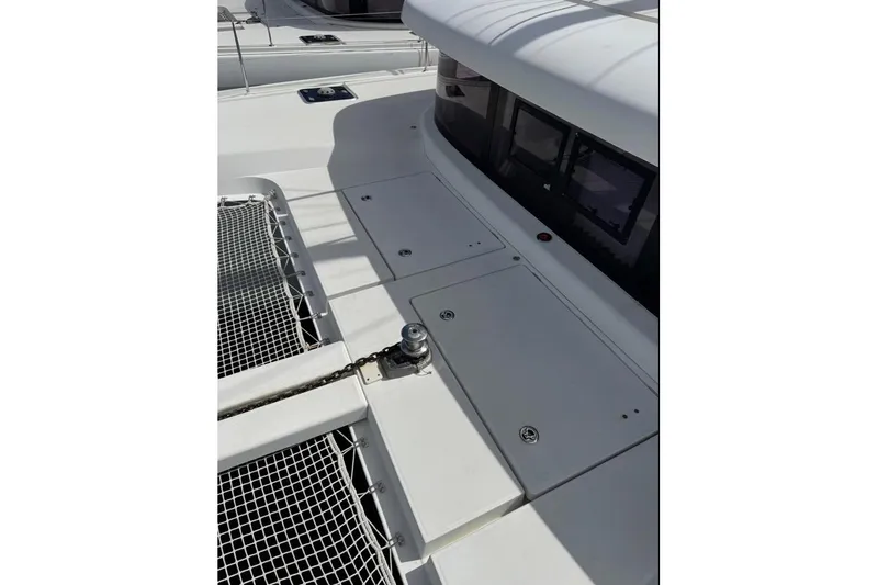  Yacht Photos Pics 2018 Lagoon 42 catamaran deck with winch and netting.