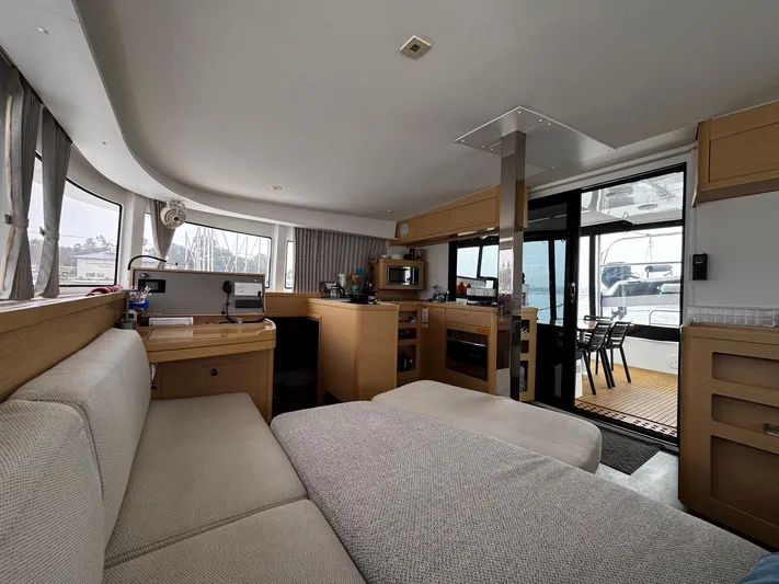 Nellie Yacht Photos Pics Interior of 2020 Lagoon 42 catamaran, featuring modern design and spacious living area.
