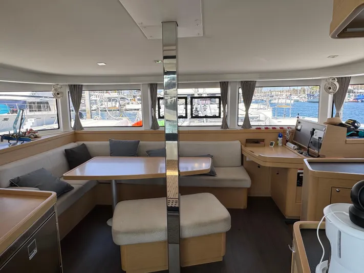 Nellie Yacht Photos Pics Interior of 2020 Lagoon 42 catamaran with spacious seating and modern design.