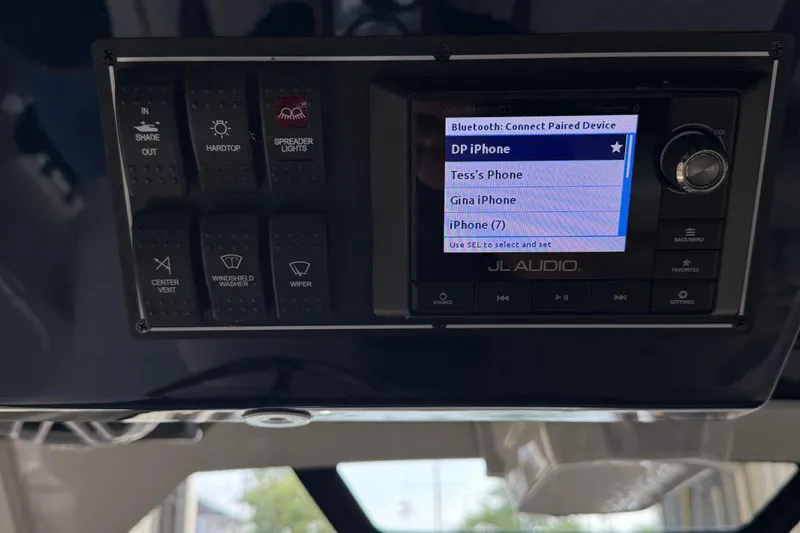  Yacht Photos Pics Control panel of a 2022 Pursuit S 328 Sport boat with Bluetooth device options.