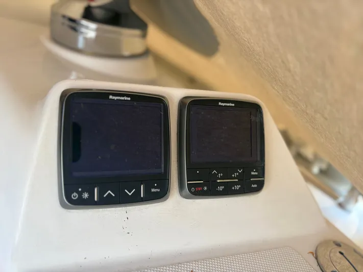 Amadeus Yacht Photos Pics Raymarine navigation displays on a 2014 Catalina 355 sailboat dashboard.