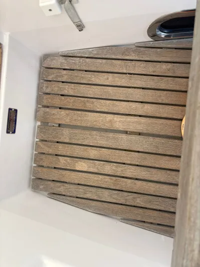 Amadeus Yacht Photos Pics Wooden deck of a 2014 Catalina 355 sailboat, featuring slatted design.