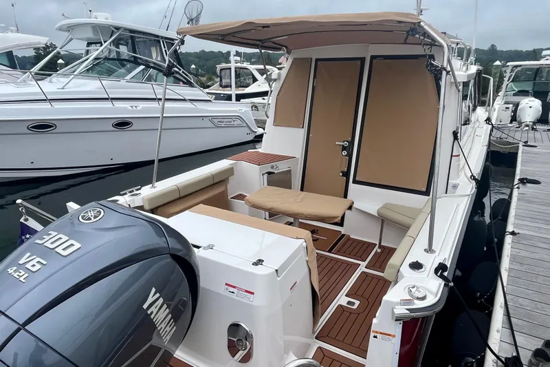  Yacht Photos Pics 2023 Ranger Tugs R-27 boat with Yamaha 300 V6 engine docked at marina.