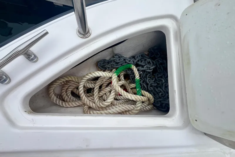  Yacht Photos Pics Ranger Tugs R-27 boat storage compartment with coiled rope and chain, 2023 model.