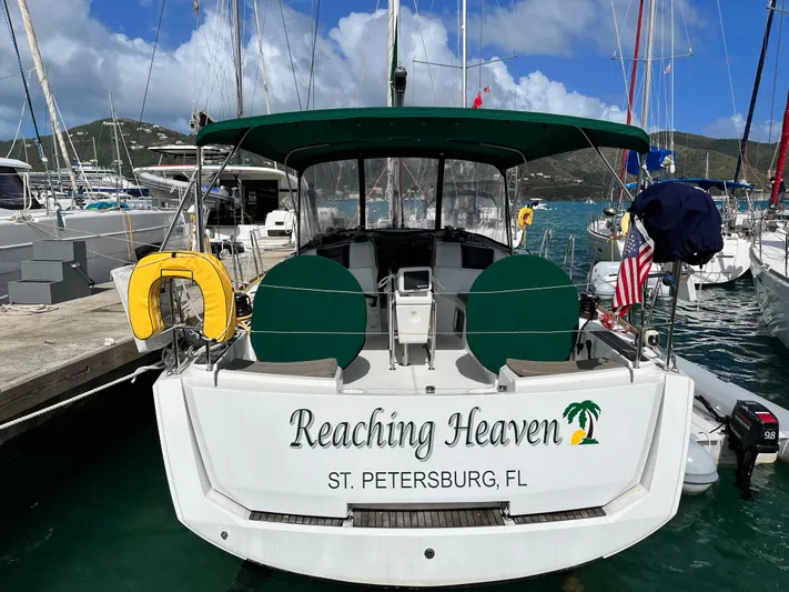 Reaching Heaven Yacht Photos Pics Jeanneau Sun Odyssey 389 sailboat named "Reaching Heaven" docked in St. Petersburg, FL marina.