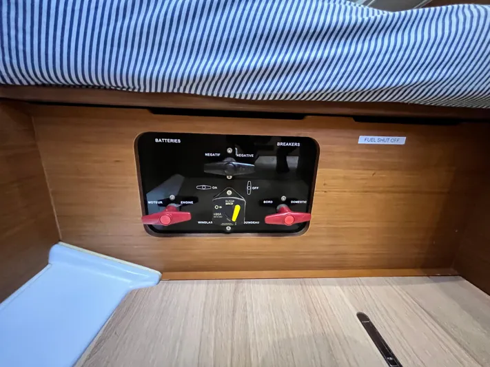 Reaching Heaven Yacht Photos Pics Control panel on 2019 Jeanneau Sun Odyssey 389 yacht, featuring battery and breaker switches.