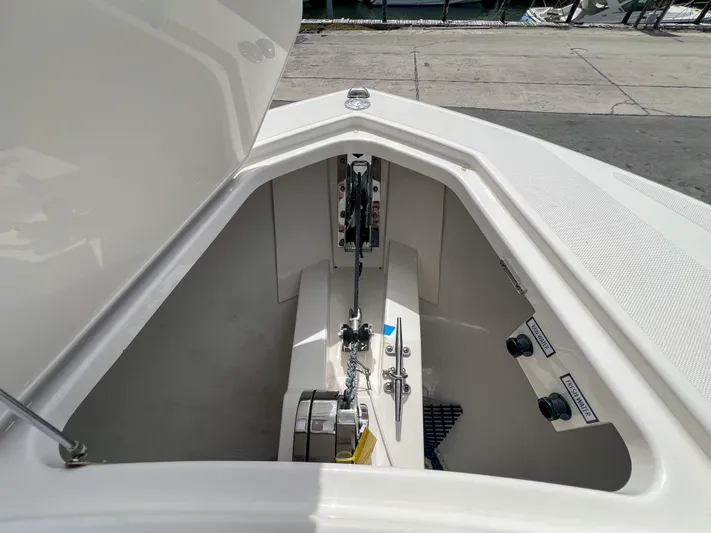  Yacht Photos Pics 2023 Tiara Yachts 38 LS anchor compartment with chain and controls.