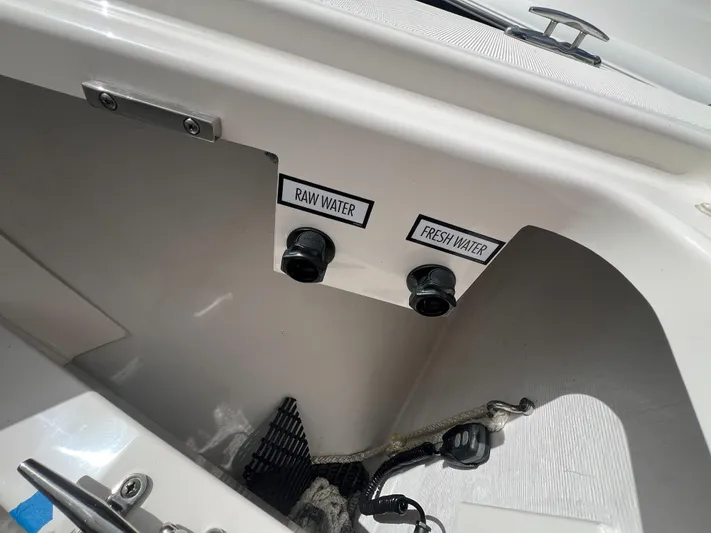  Yacht Photos Pics 2023 Tiara Yachts 38 LS water connections labeled "Raw Water" and "Fresh Water."