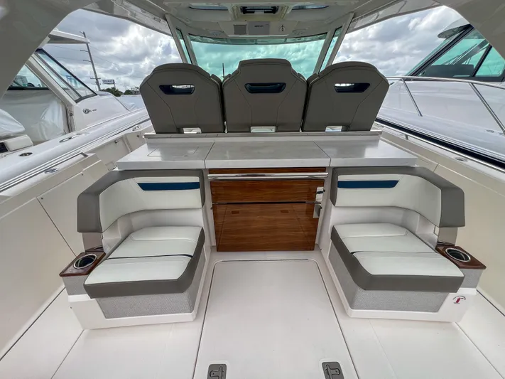  Yacht Photos Pics 2023 Tiara Yachts 38 LS interior with luxurious seating and modern design.