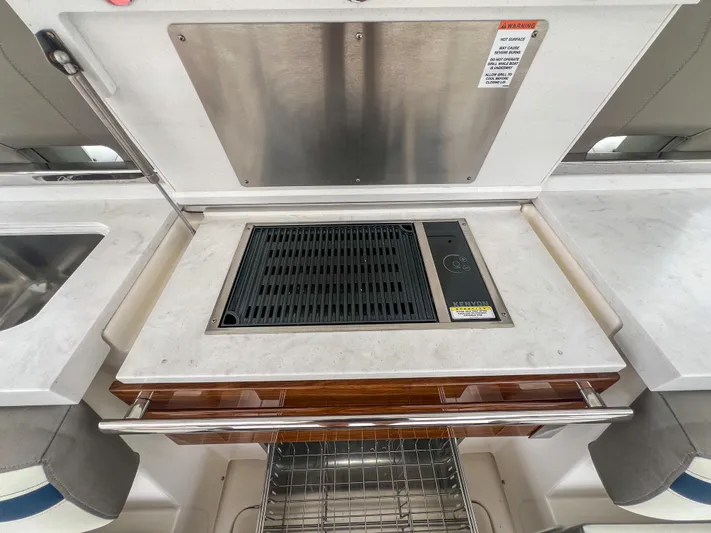  Yacht Photos Pics 2023 Tiara Yachts 38 LS yacht grill and sink area with modern design.